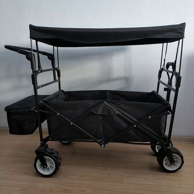 Zwarte die Strandwagen 600D vouwen die Wagen met Dekking en Duwhandvat vouwen