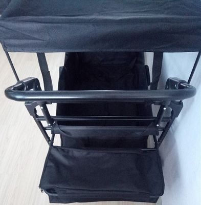 Zwarte die Strandwagen 600D vouwen die Wagen met Dekking en Duwhandvat vouwen